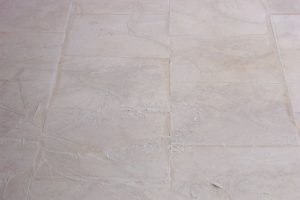 A closer look at the grinding mud | Grinding & Lippage | Travertine | Baker's Travertine Power Clean