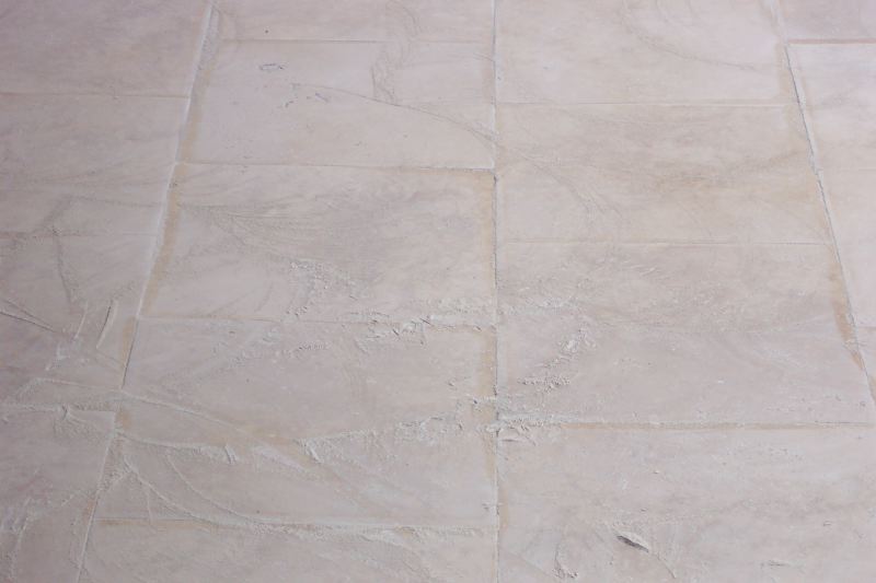A closer look at the grinding mud | Grinding & Lippage | Travertine | Baker's Travertine Power Clean