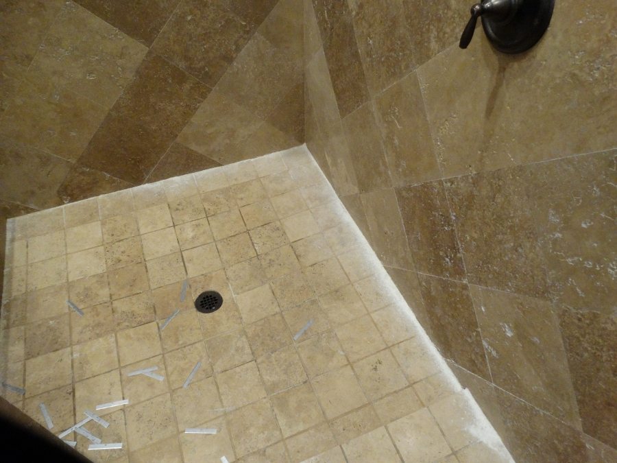 Cleaning & scraping travertine shower in Scottsdale | Showers & Vanities | Interior Gallery | Baker's Travertine Power Clean